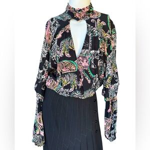 FREE PEOPLE Black long sleeve choker collar tiger print blouse  
Med